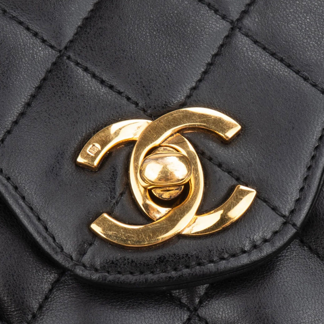 Chanel Quilted Lambskin 24K Gold Medium Double Flap Crossbody Bag