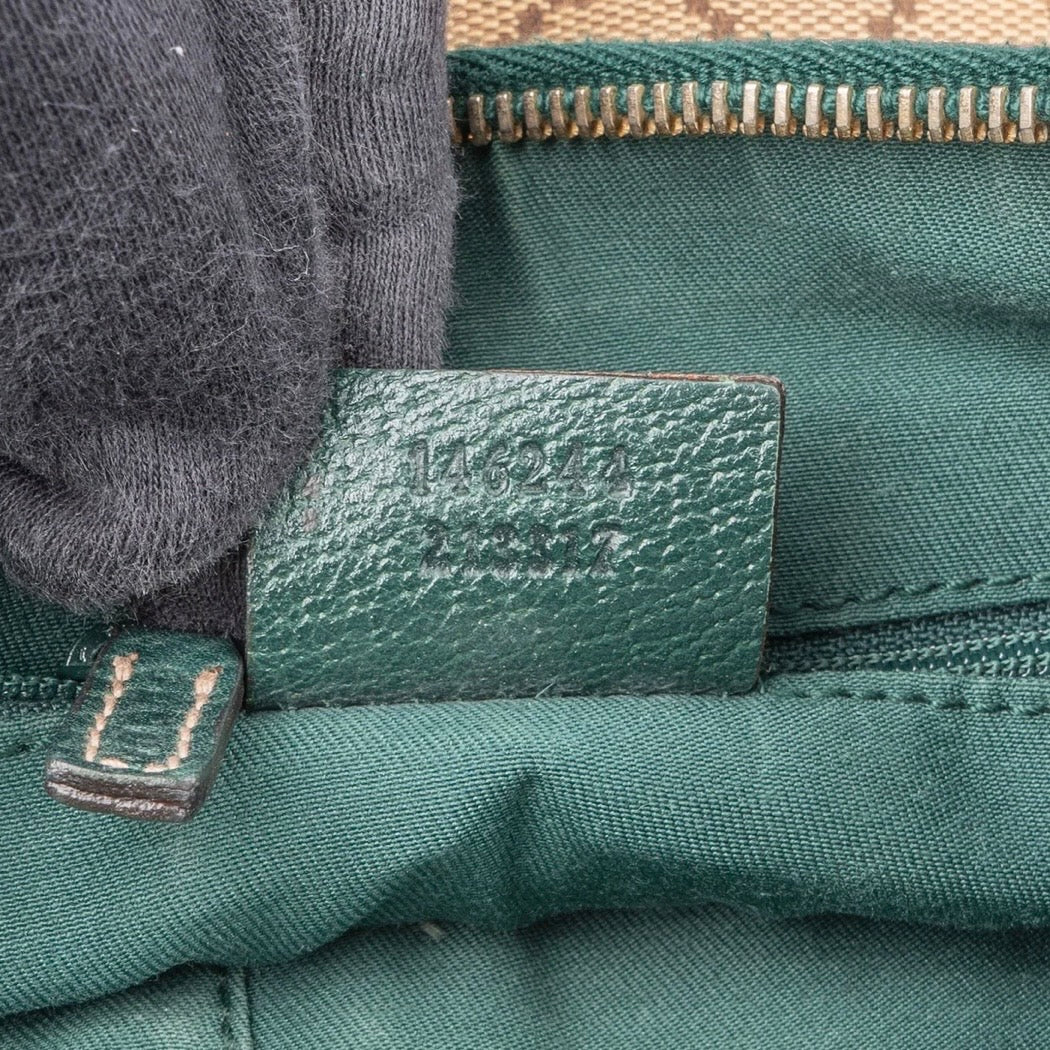 Gucci Monogram GG
Canvas Pochette Handbag