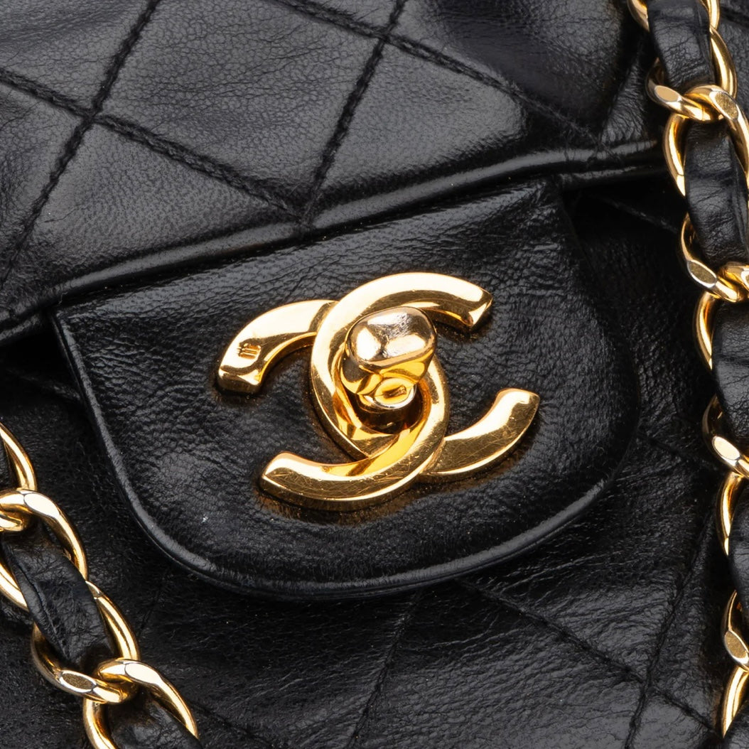 Chanel Quilted Lambskin 24K Gold Medium Double Flap Crossbody Bag