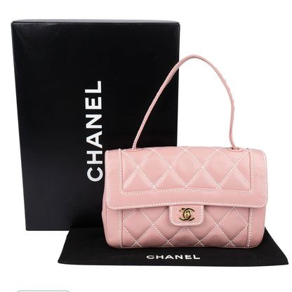 Chanel Quilted Lambskin
24K Gold Single
Flap Rabat Handbag