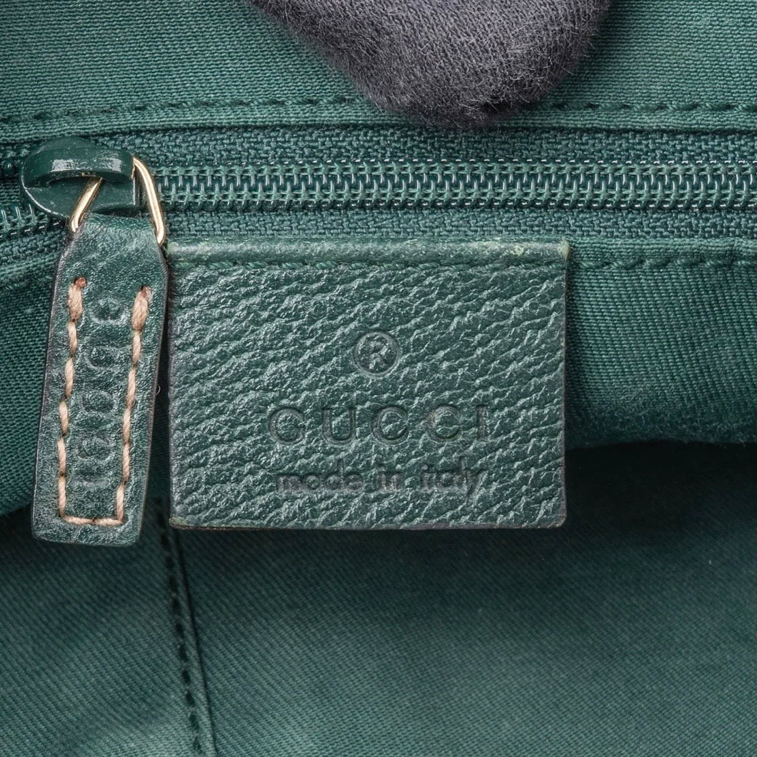 Gucci Monogram GG
Canvas Pochette Handbag