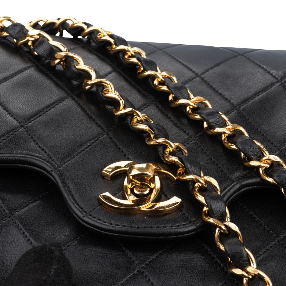Chanel Quilted Lambskin 24K Gold Medium Double Flap Crossbody Bag