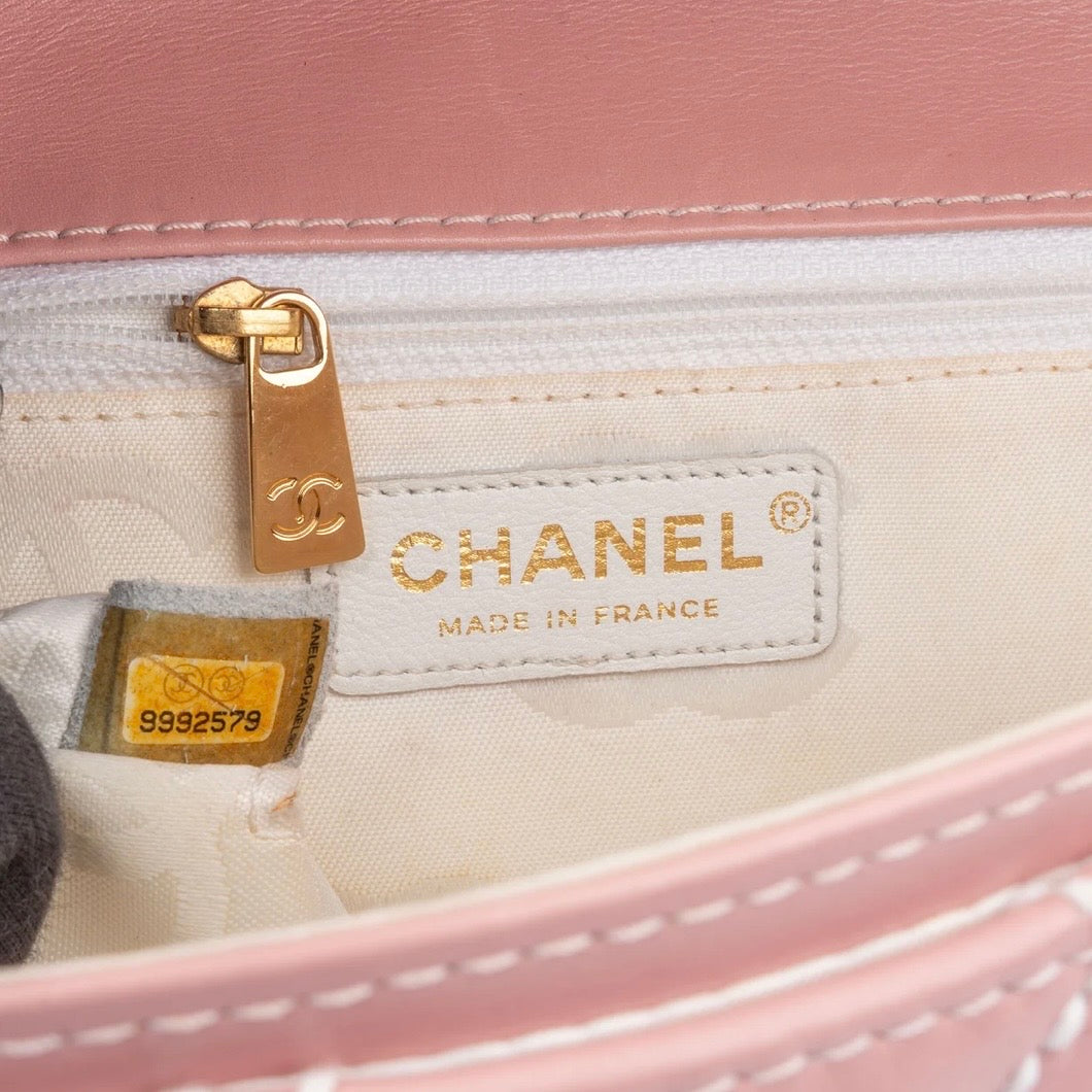 Chanel Quilted Lambskin
24K Gold Single
Flap Rabat Handbag