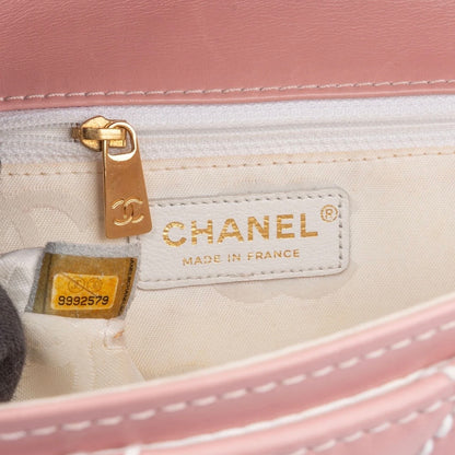 Chanel Quilted Lambskin
24K Gold Single
Flap Rabat Handbag