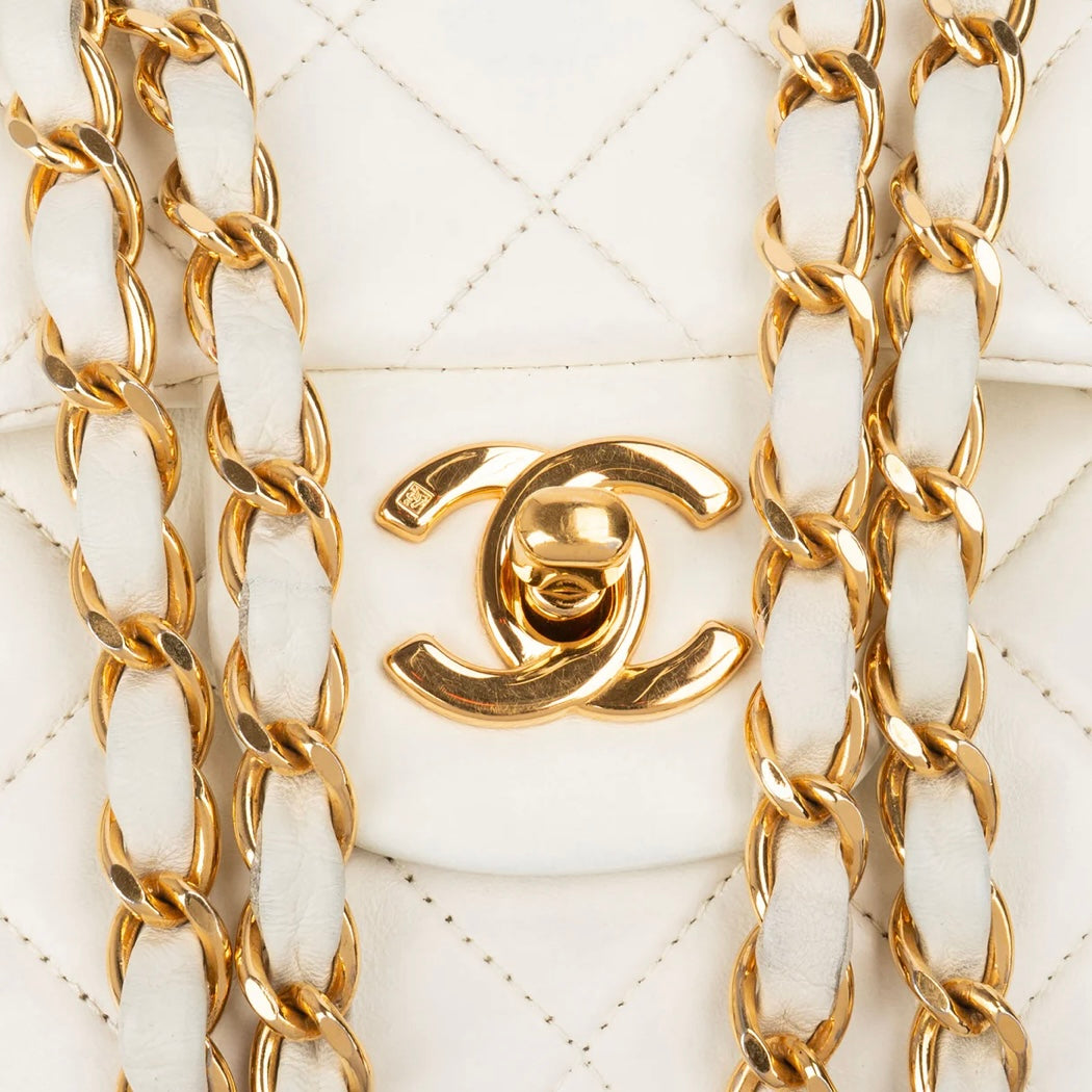 Chanel Quilted Lambskin 24K Small Double Flap Crossbody Bag