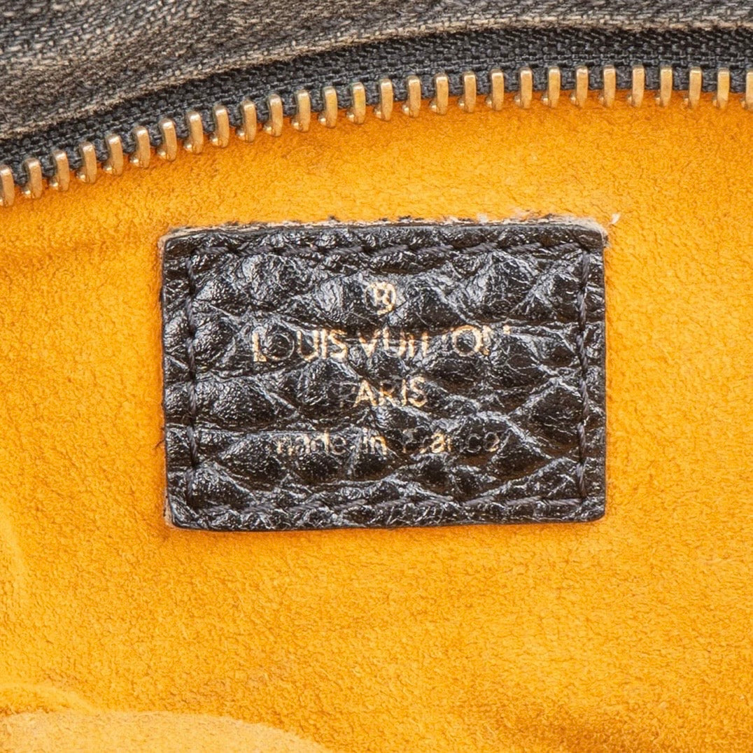 Louis Vuitton
Monogram Denim Neo
Cabby MM Handbag