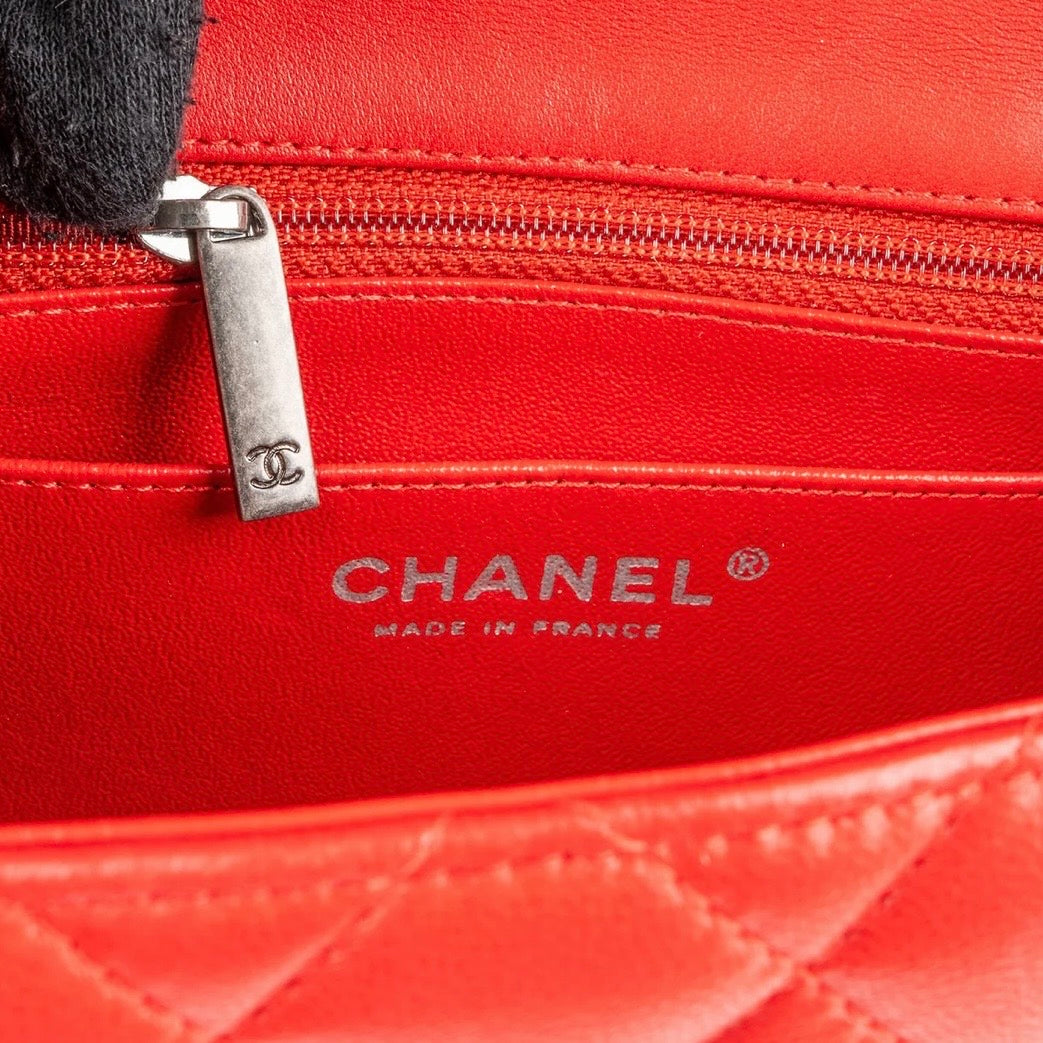 Chanel Quilted Lambskin Mini Rectangular Single
Flap Crossbody Bag
